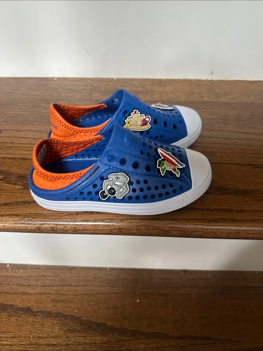Sketchers Foamies Kids Blue Slip-On Clog Sneakers with Orange Trim